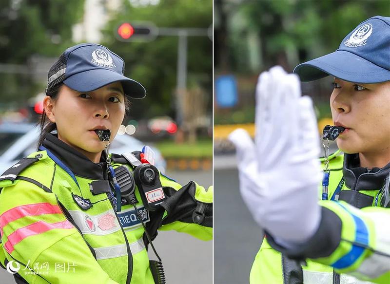 深圳市公安局交警支队机训大队二中队民警吴惠山正在路口指挥交通。人民网 王星摄